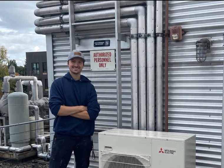 Rylan Utter of ExactAir Home Comfort on a heating and cooling job in Everett, WA