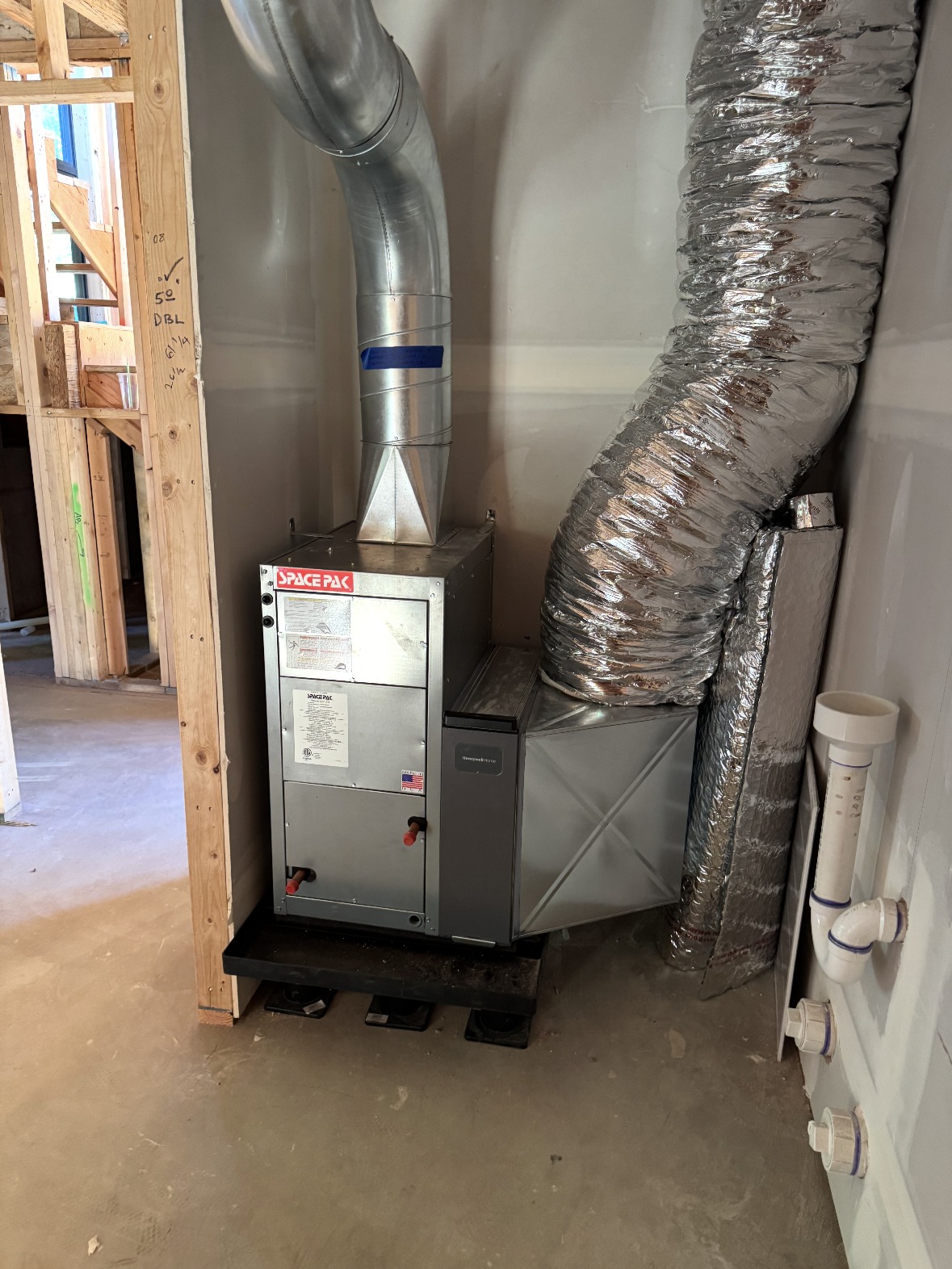 SpacePak small-duct high-velocity air handler installed in a new construction home near Everett, WA