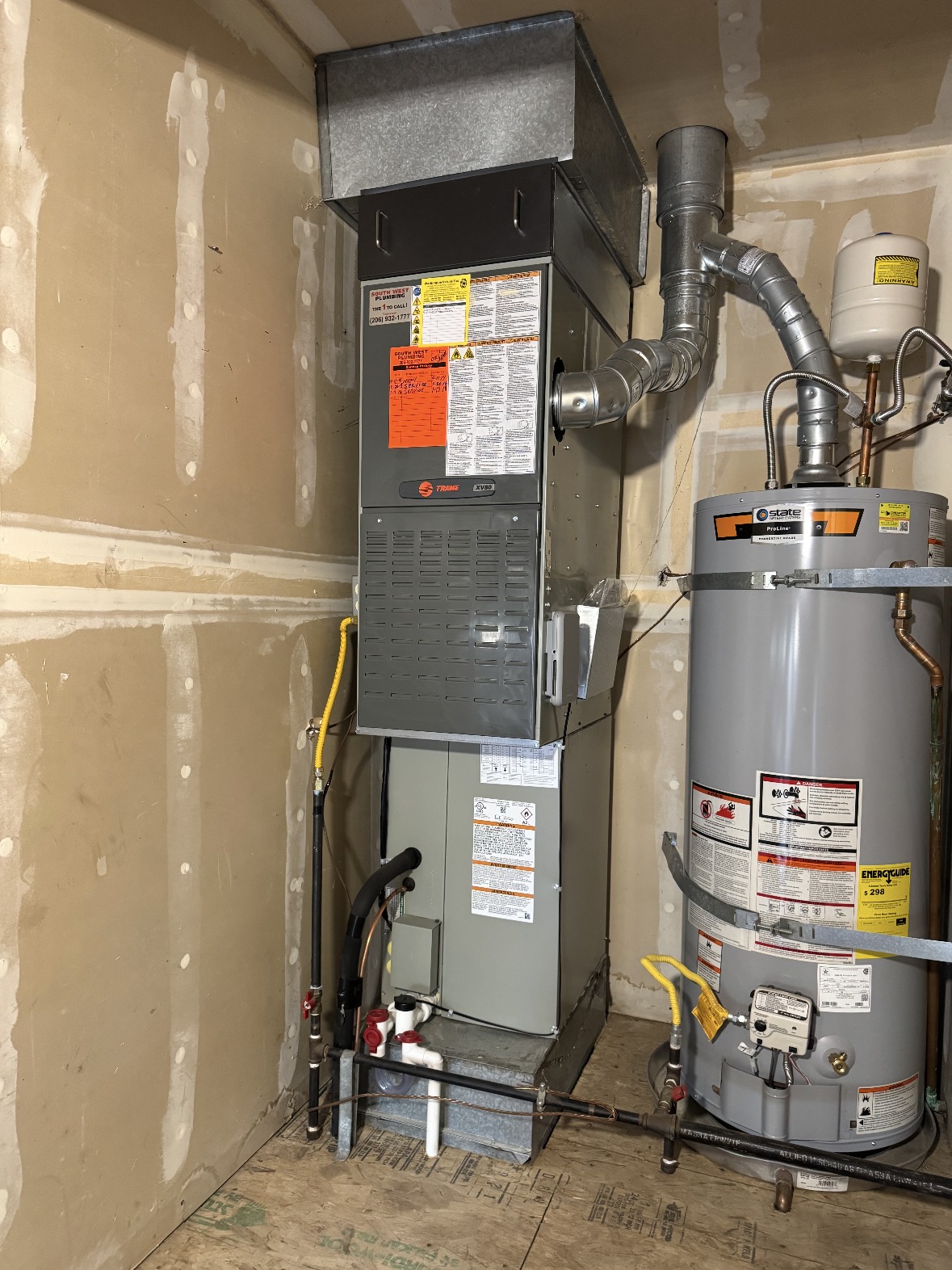 Trane XV80 gas furnace and matched air handler installed in a utility closet in Everett, WA